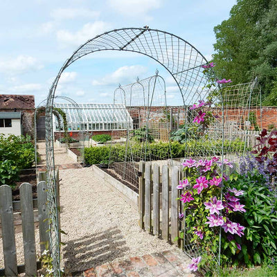 elegant kitchen garden with garden arch