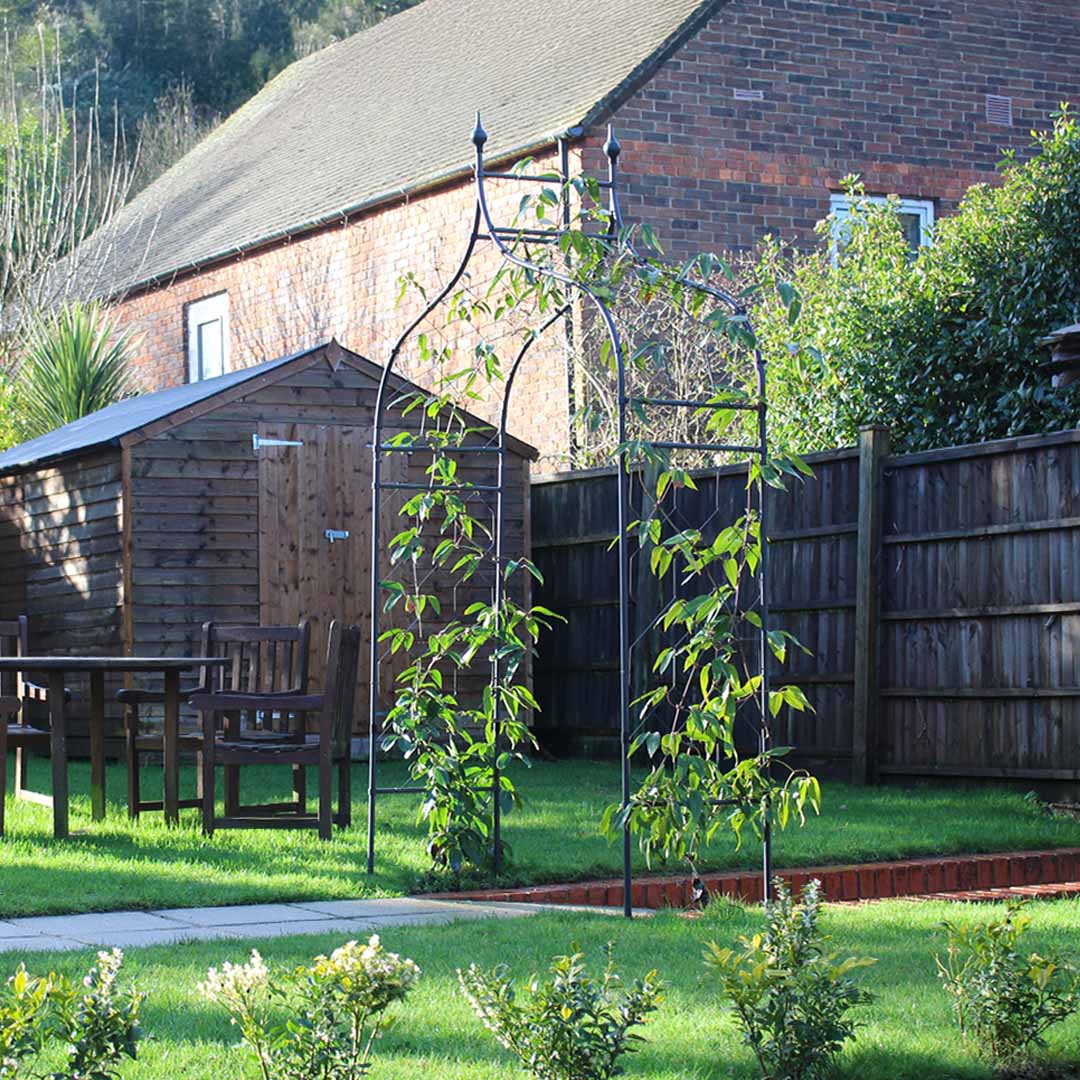 gothic arch structure in a garden