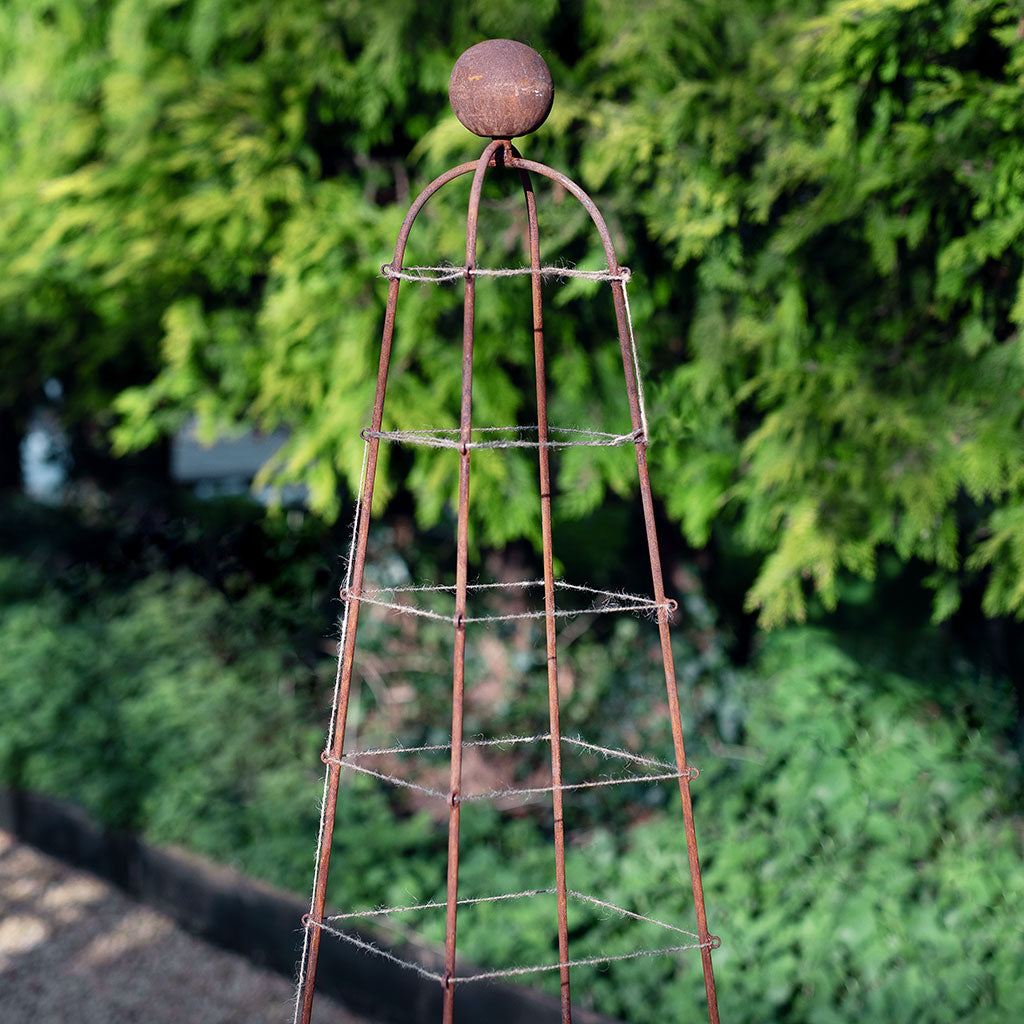 obelisk with jute string