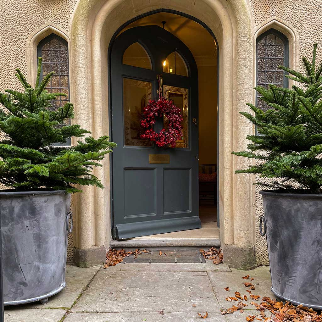 zinc planters on doorstep