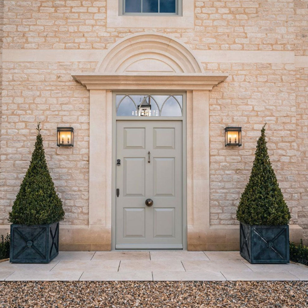 regency planters outside a door