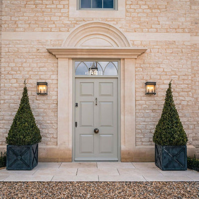 regency planters outside a door